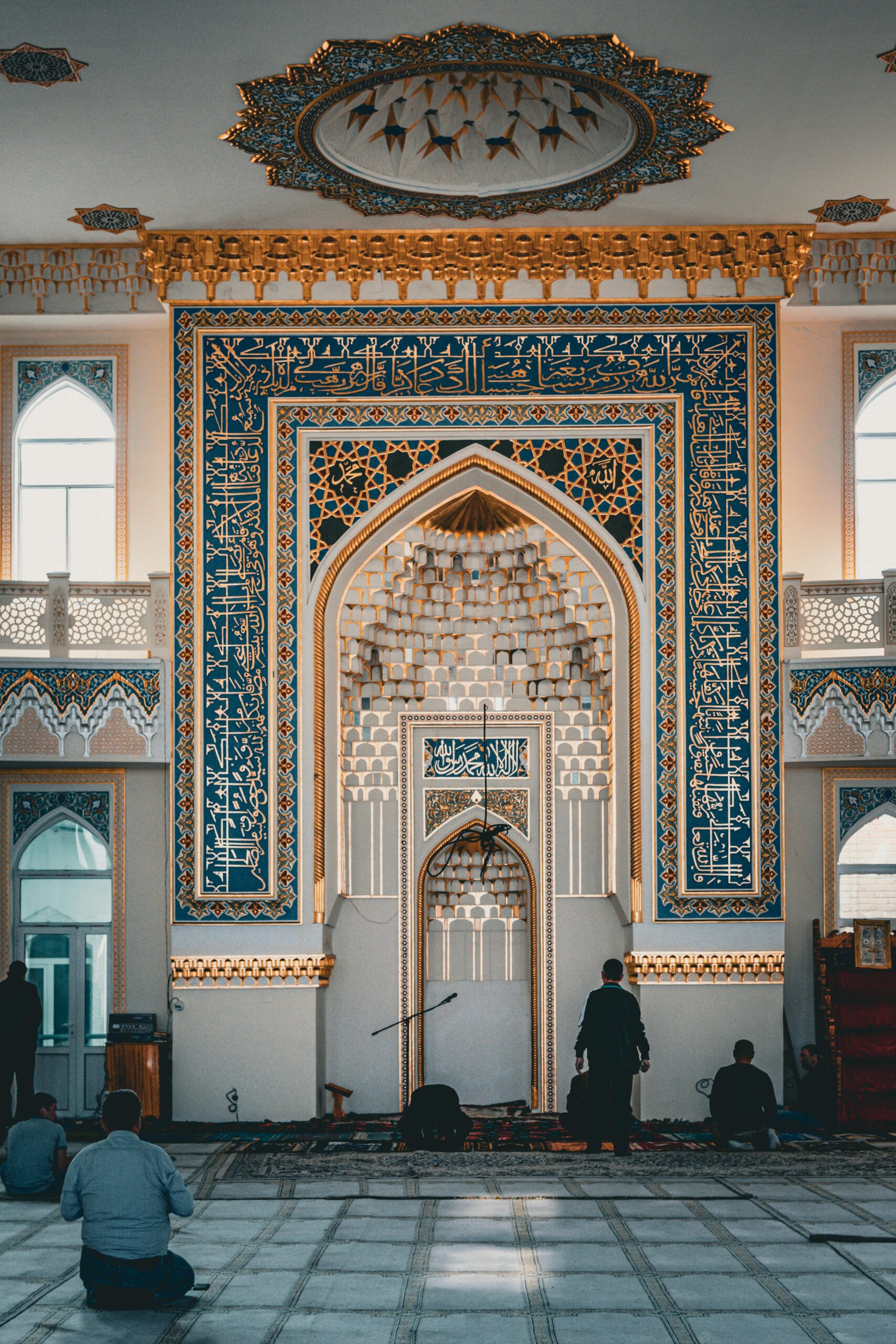 Ornate mosque interior in Khujand featuring traditional Islamic architecture and intricate details.